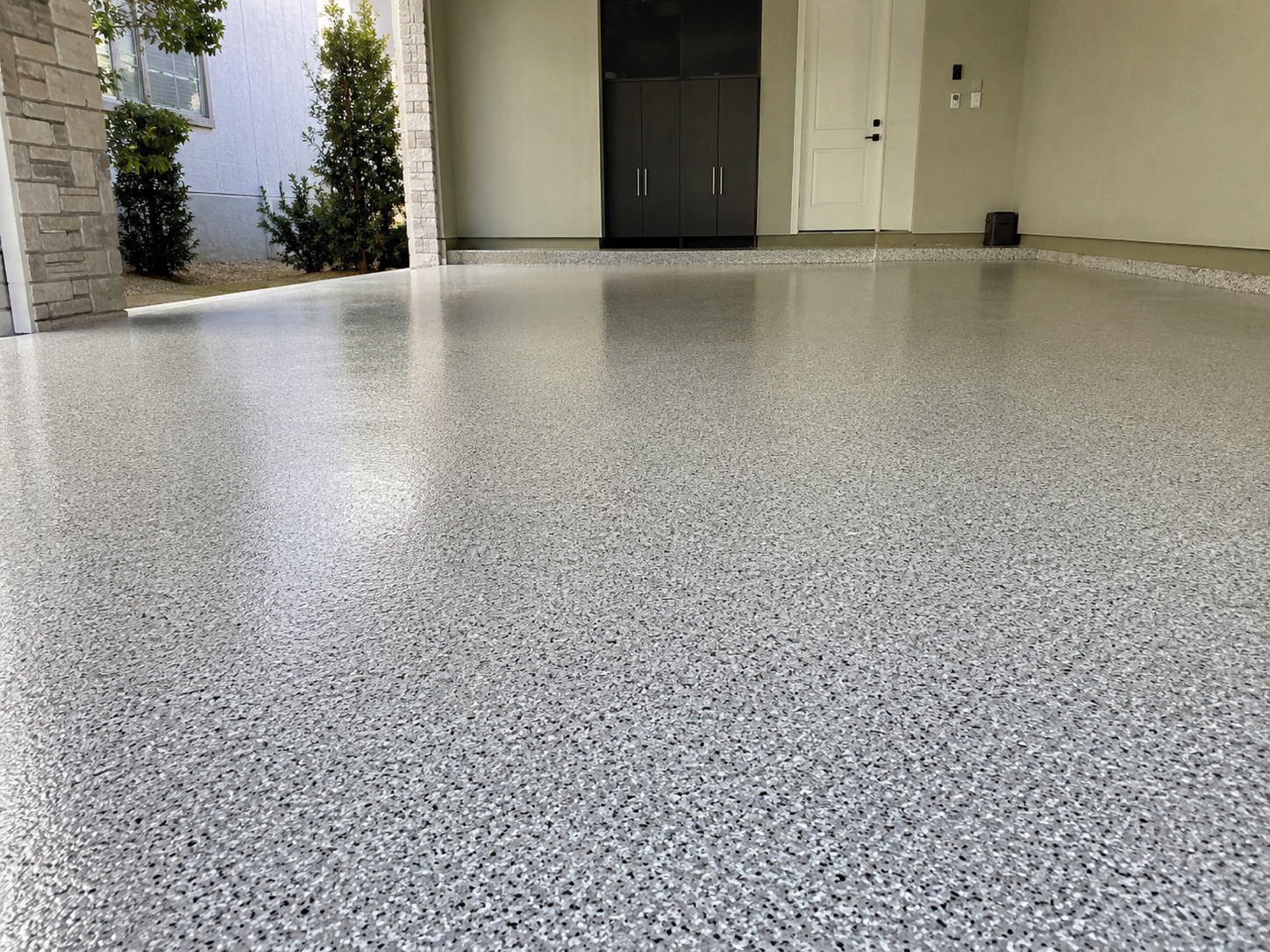 Epoxy-coated concrete floor with glossy finish